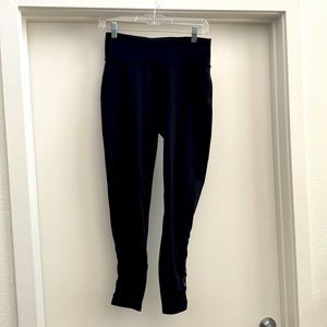 Lululemon black workout pants, large. Cute braided design flatters lower legs